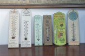 SIX WOODEN ADVERTISING THERMOM