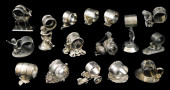 SIXTEEN ASSORTED FIGURAL NAPKI