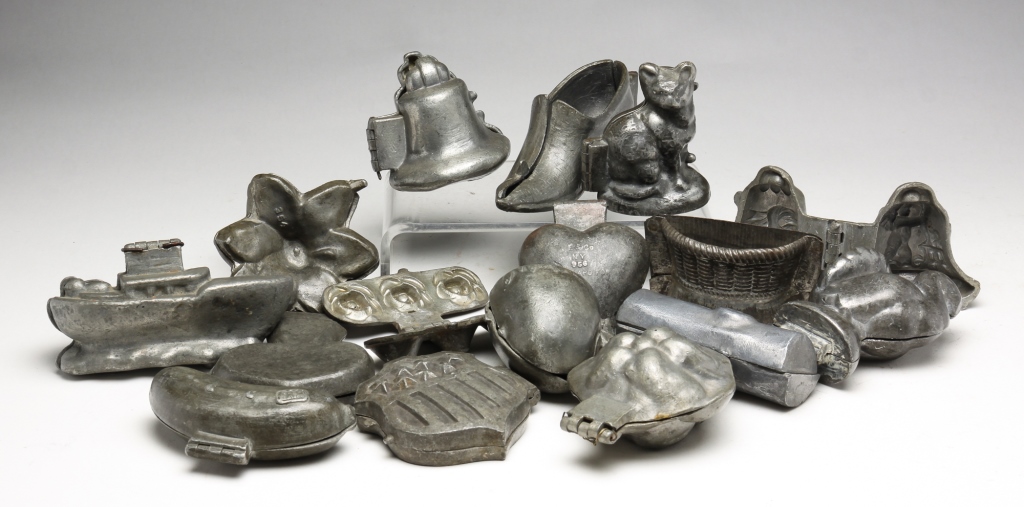 SIXTEEN PEWTER ICE CREAM MOLDS.