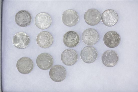 SIXTEEN SILVER DOLLARS. Including