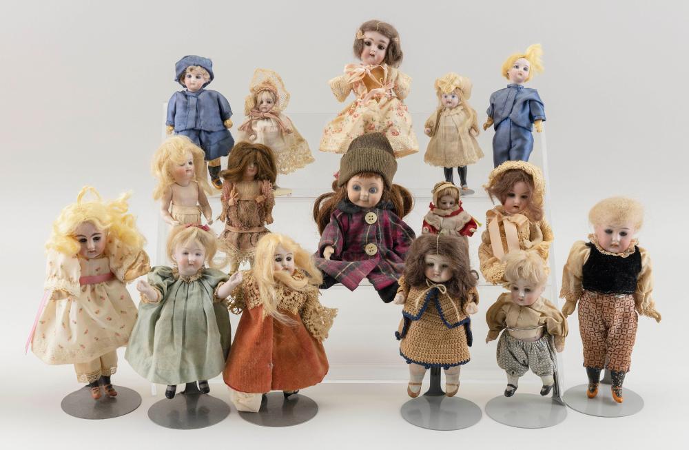 SIXTEEN SMALL GERMAN BISQUE DOLLS