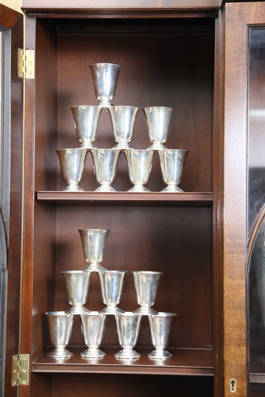 SIXTEEN STERLING SILVER CORDIALS.