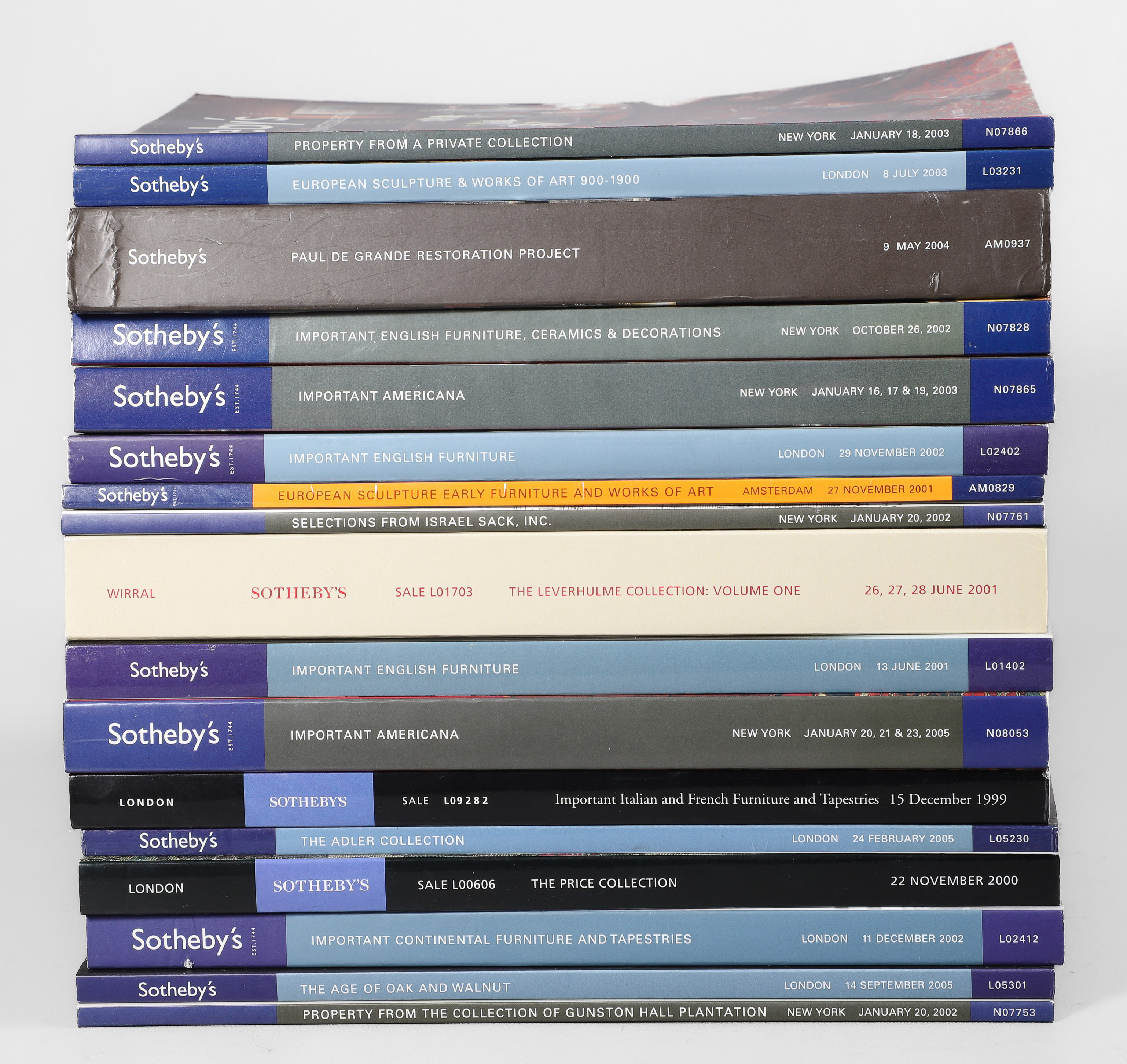 Sixteen various auction catalogs