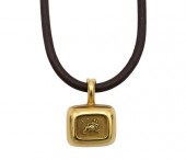 SLANE 18 KARAT GOLD AND LEATHE