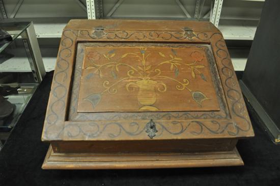 Slant-lid writing desk with vase