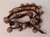 SLEIGH BELLS ON LEATHER BELTOl