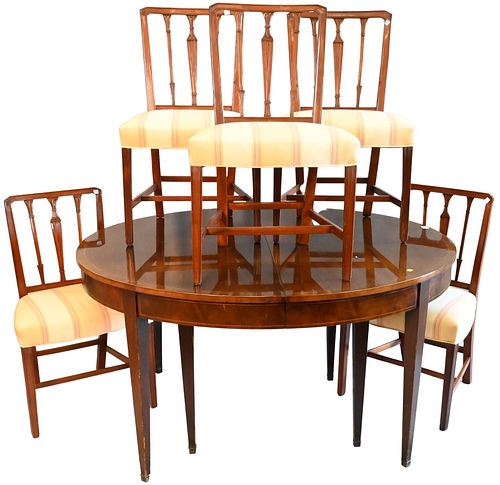 SLIGHTLY OVAL MAHOGANY DINING TABLE