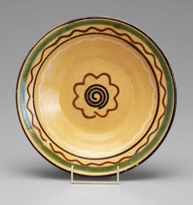 Slip-decorated redware bowl,