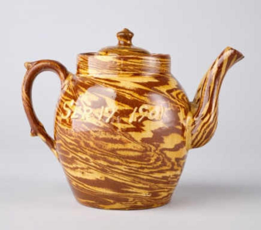 SLIP DECORATED TEA POTA slip