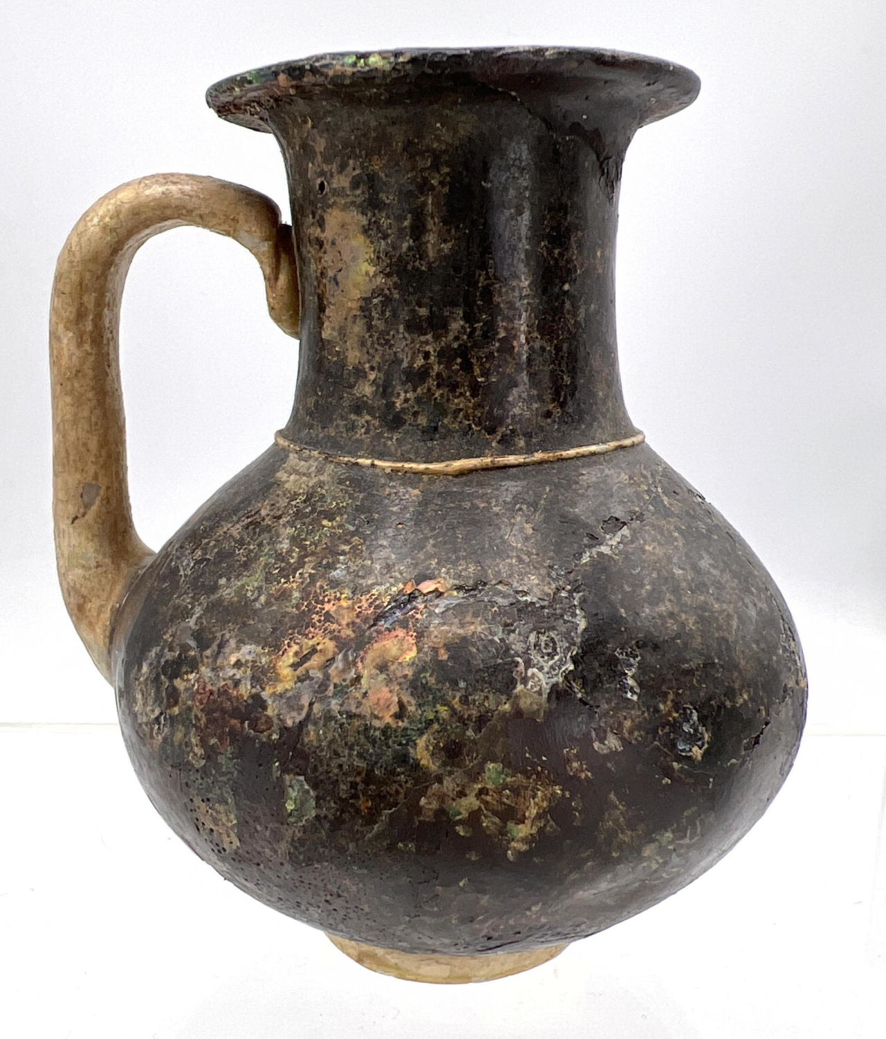 Small Ancient Roman glass purple