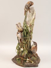 SMALL BIRDS ON FOLIATED STUMP