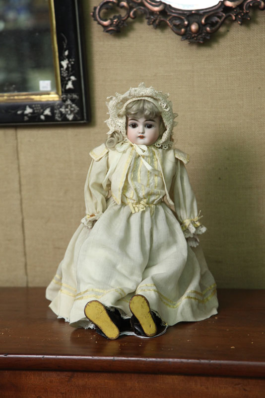 SMALL BISQUE HEAD DOLL. Marked