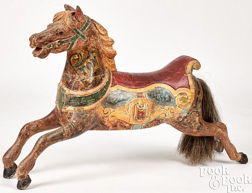 SMALL CARVED AND PAINTED CAROUSEL