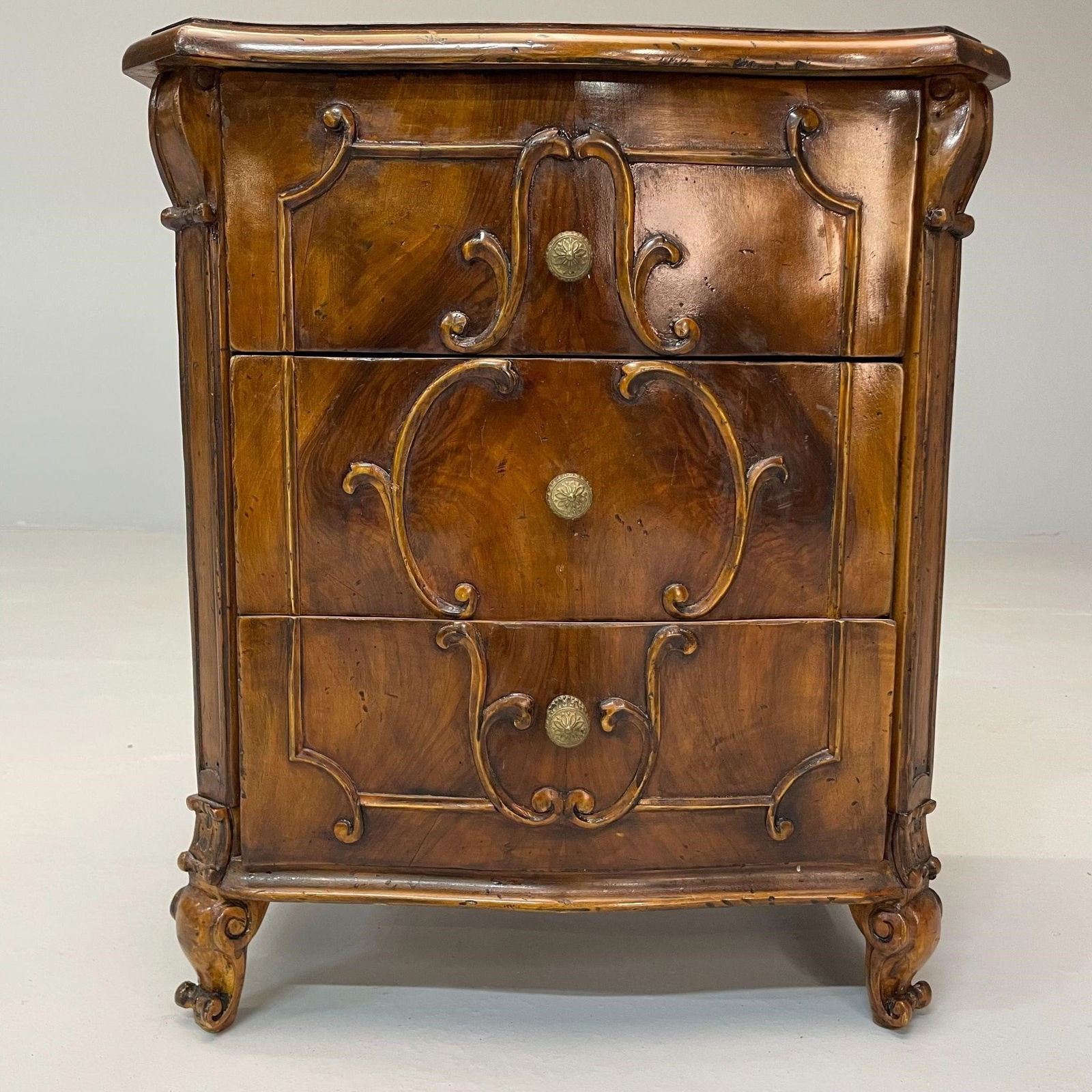 SMALL CARVED WOOD COMMODE OR SIDE
