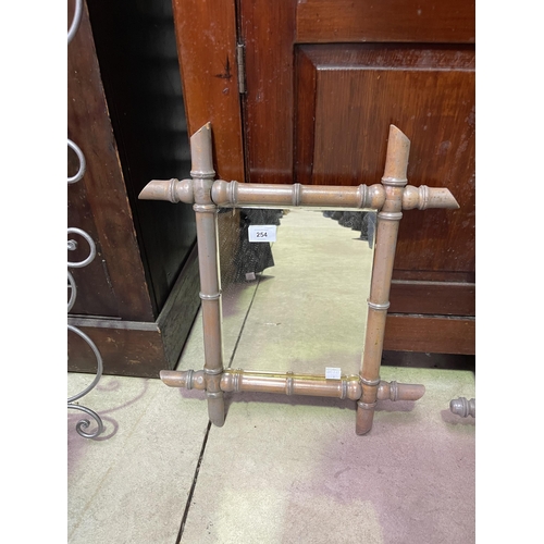 Small faux bamboo mirror. approx 49