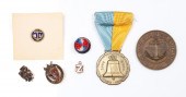 Small medals and gold pins to