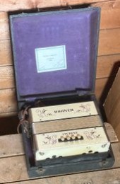 Small vintage white Hohner stu