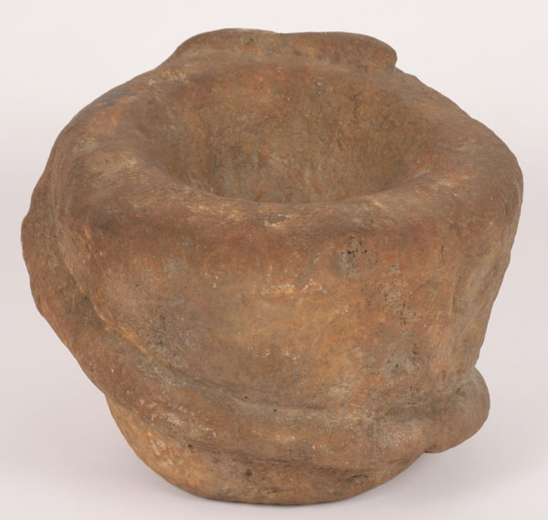 Snake effigy stone mortar. 13