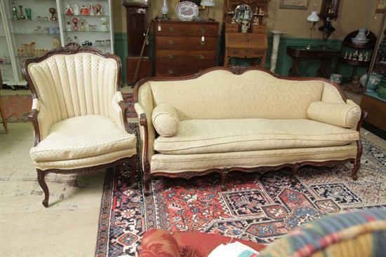 SOFA AND ARMCHAIR. Both walnut with