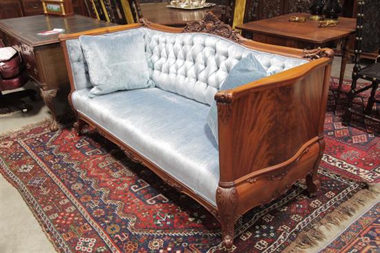 SOFA. Mahogany veneered having a