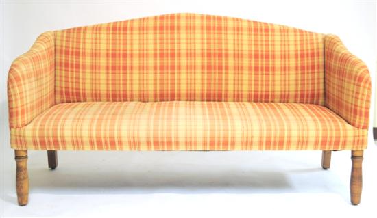 Sofa upholstered in salmon and
