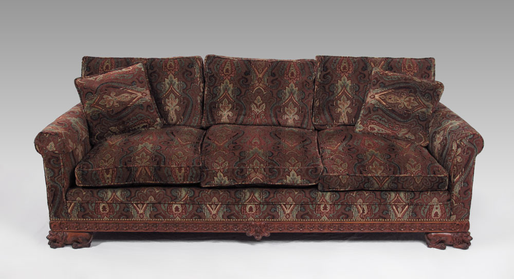 SOFA WITH CARVED FIGURAL LION FEET: