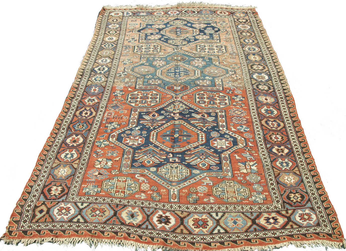 SOUMAK RUG Column of three gabled