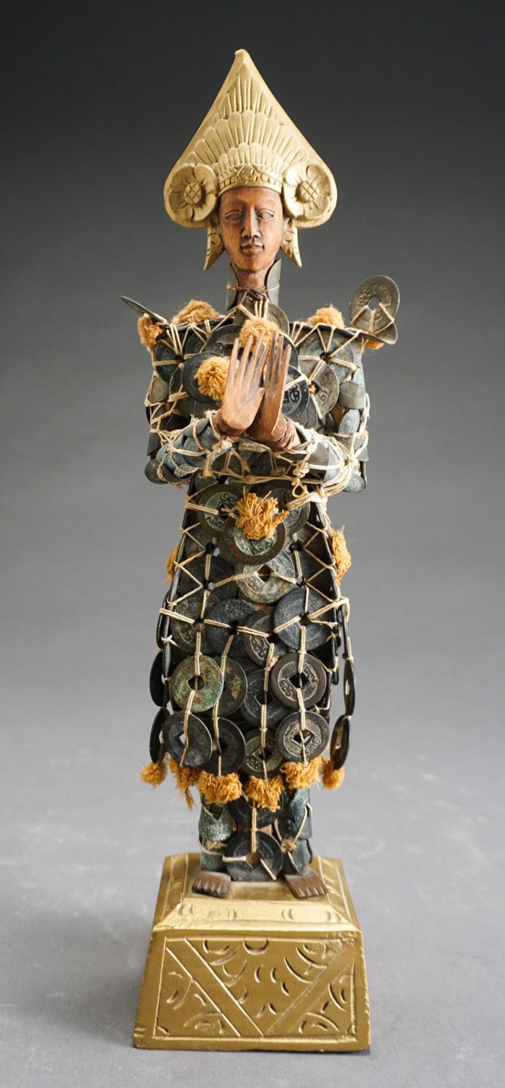 SOUTHEAST ASIAN COIN-BOUND CARVED