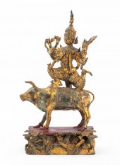 SOUTHEAST ASIAN GILT METAL SHI