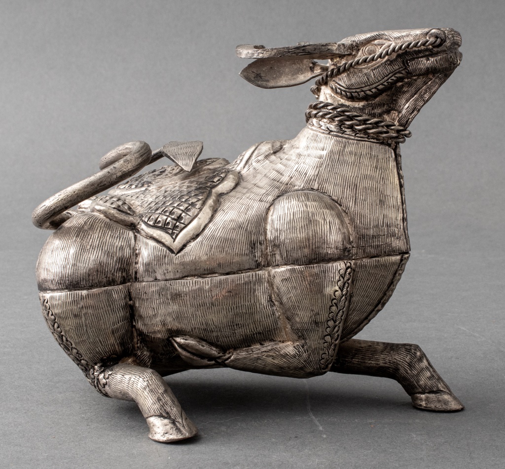 SOUTHEAST ASIAN WHITE COPPER SEATED