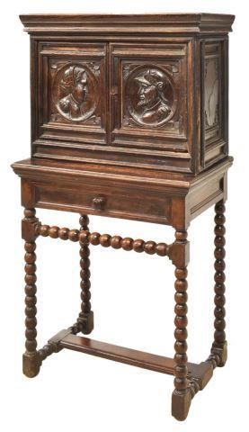 SPANISH CARVED OAK STEPBACK CABINET