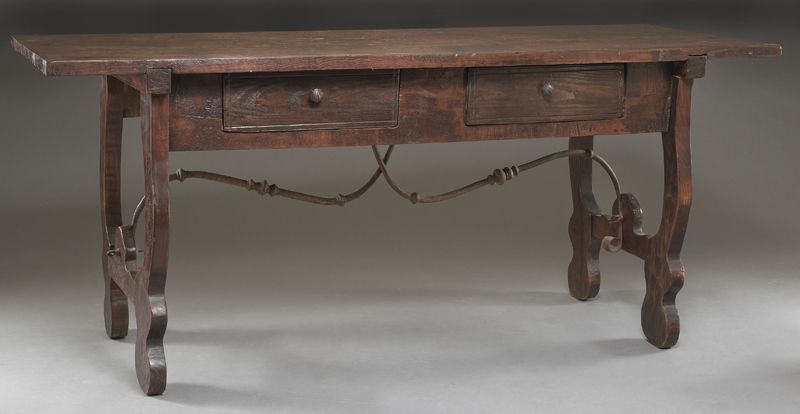 Spanish trestle table having a