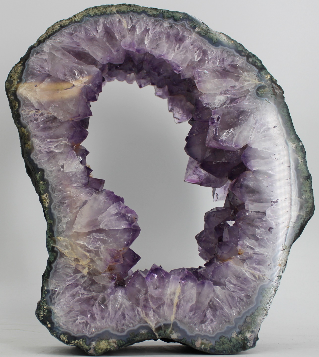 SPECIMEN. AMETHYST CIRCLE SLICE. An