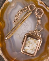SPINNER LOCKET FOB WITH GOLD P