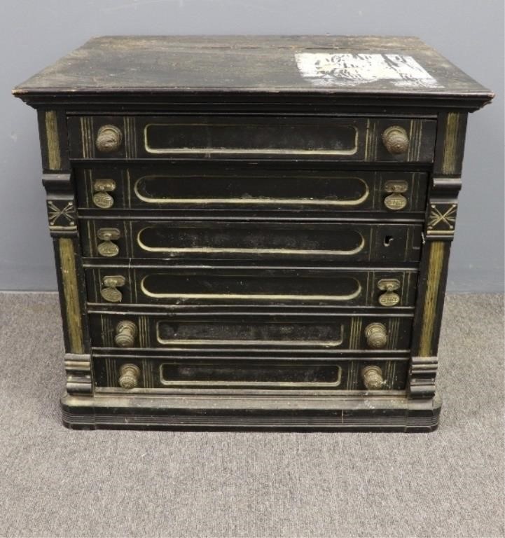 Spool cabinet painted black,