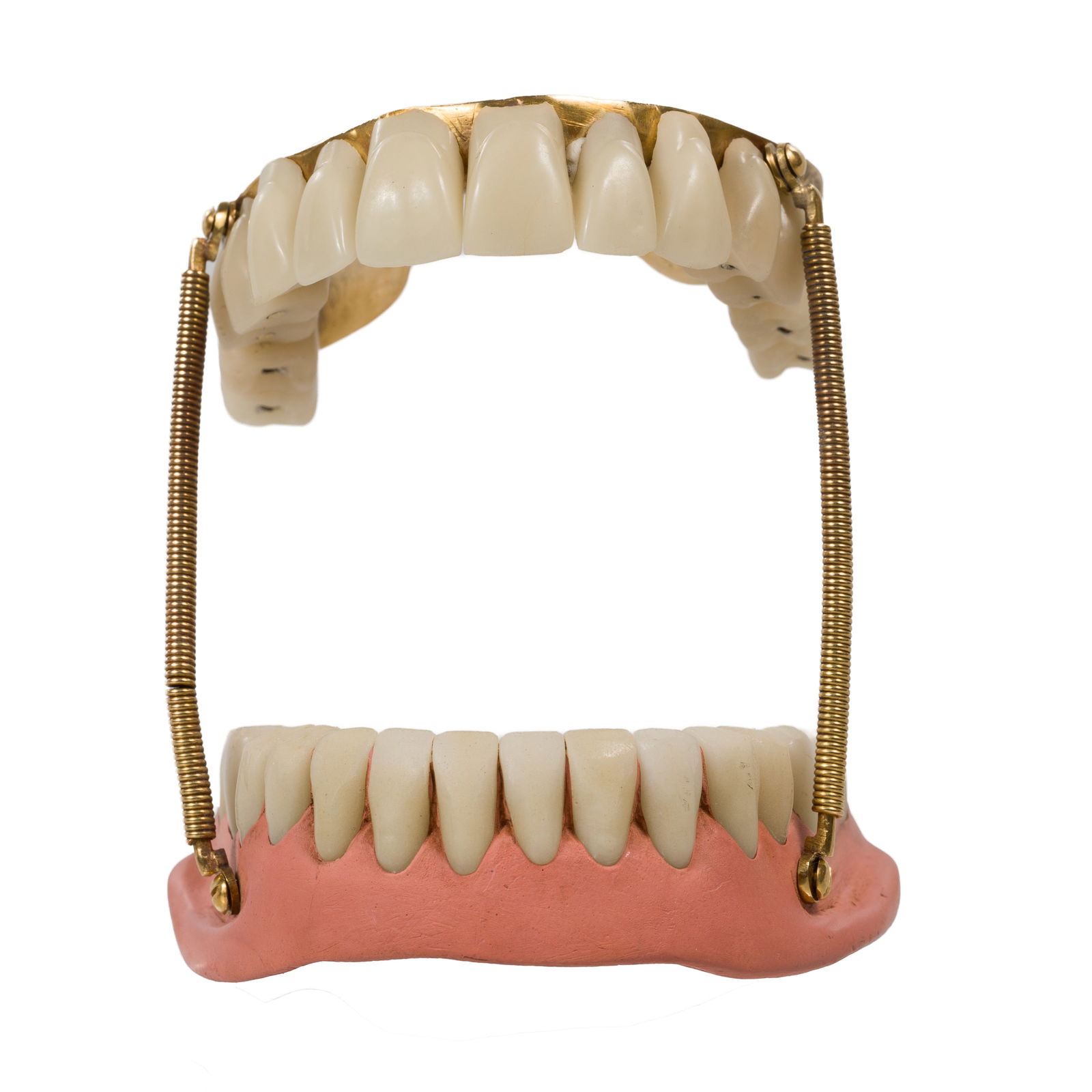 SPRUNG DENTURES IN GOLD &