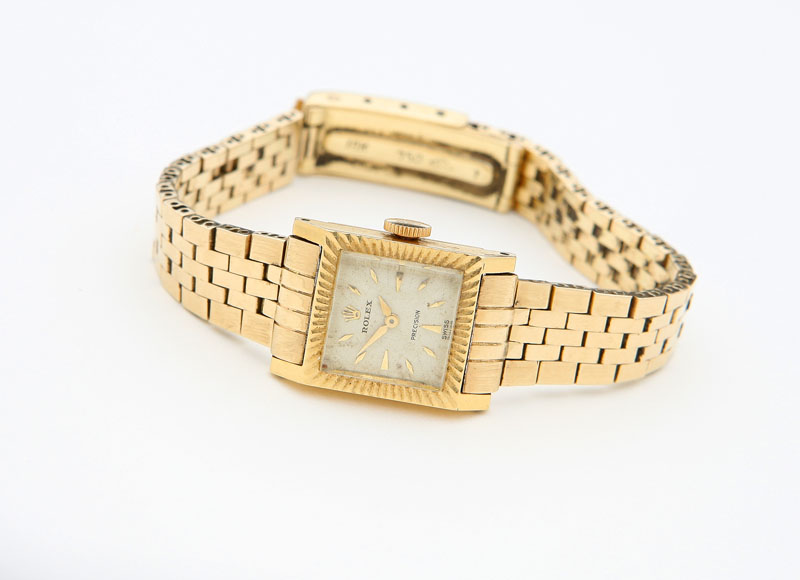 Square white dial with applied gold