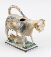 STAFFORDSHIRE CERAMIC COW CREA