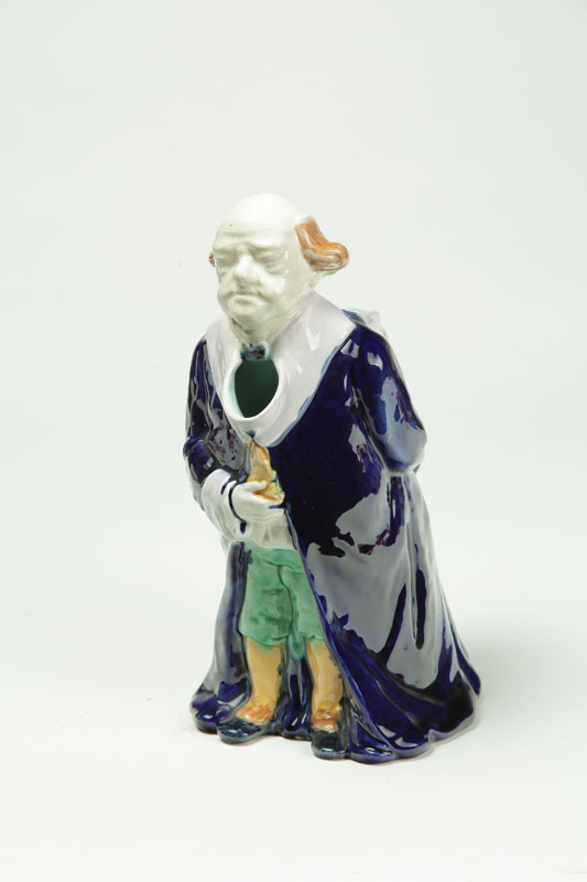 STAFFORDSHIRE FIGURAL PITCHER. 