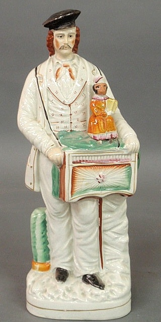 Staffordshire figure of an organ