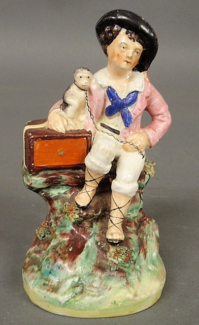 Staffordshire figure of an organ