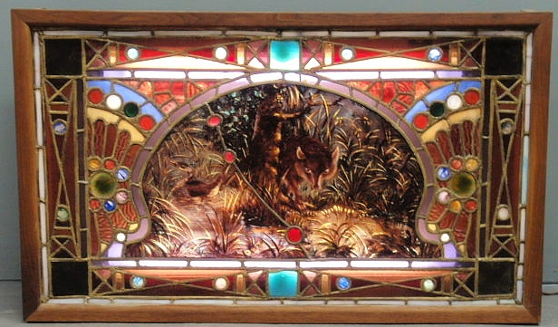 Stained glass window with a fox and