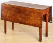 STAINED MAPLE DROP LEAF TABLE<