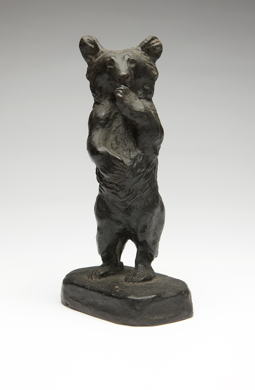 Standing bear incised with