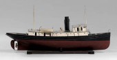 Steam-powered tug boat model,