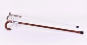 STEEL FIELD CANE AND A LUCITE