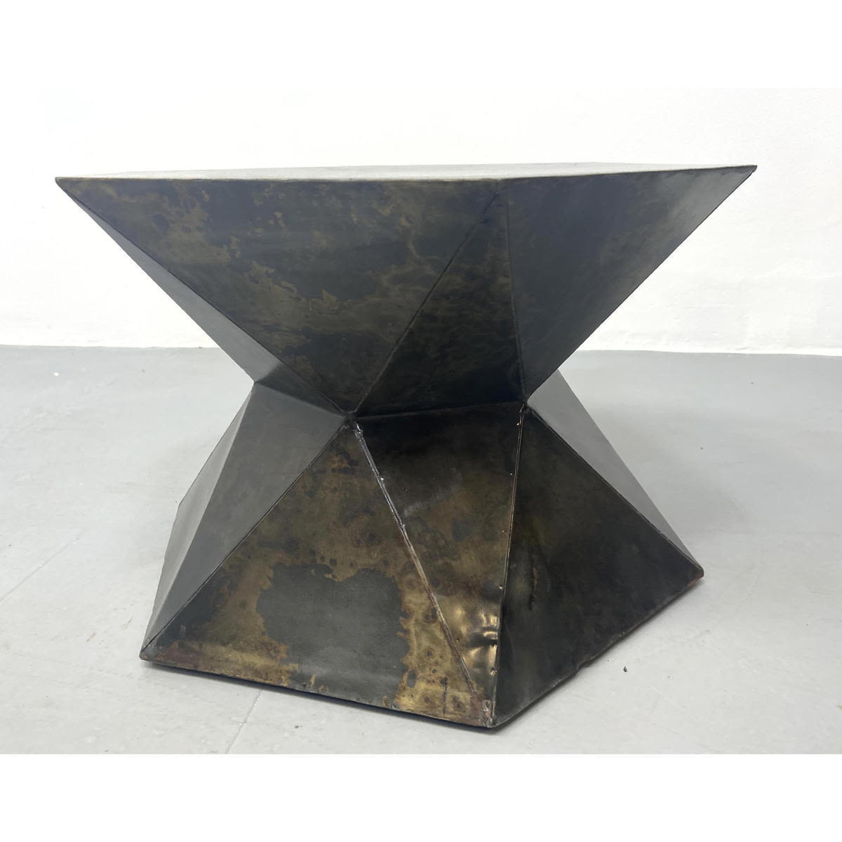 Steel geometric side table. 