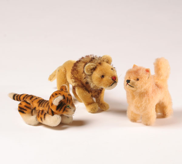 Steiff dog, lion, and tiger;
