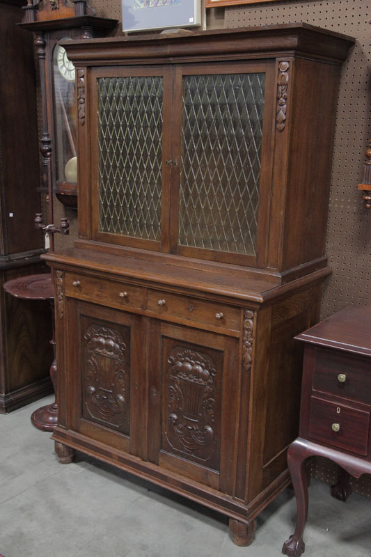 STEPBACK CUPBOARD. Oak having a