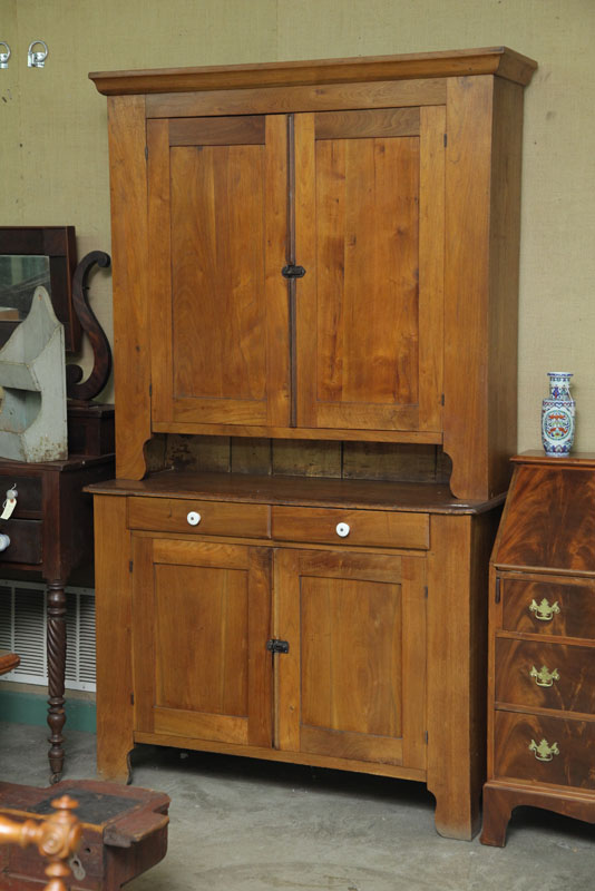 STEPBACK CUPBOARD. Walnut and